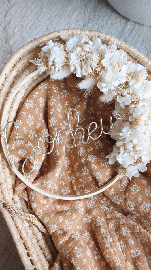 Couronne décorative en fleurs séchées